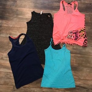 Bundle of 4 tank tops sizes XS and one Medium